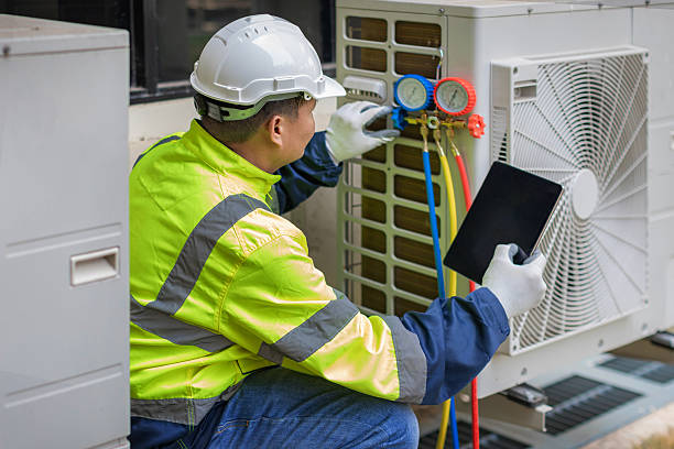 Professional Heat Pump Repair technician working in Eagle Lake, TX